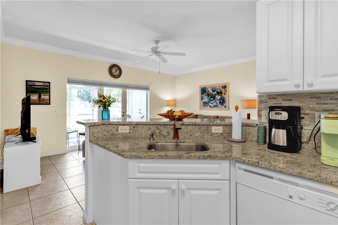 Granite countertops, along with gorgeous backsplash