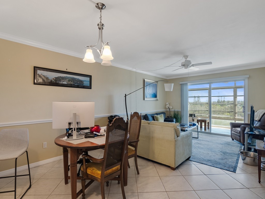 DINING AREA TO GREAT ROOM AND PORCH
