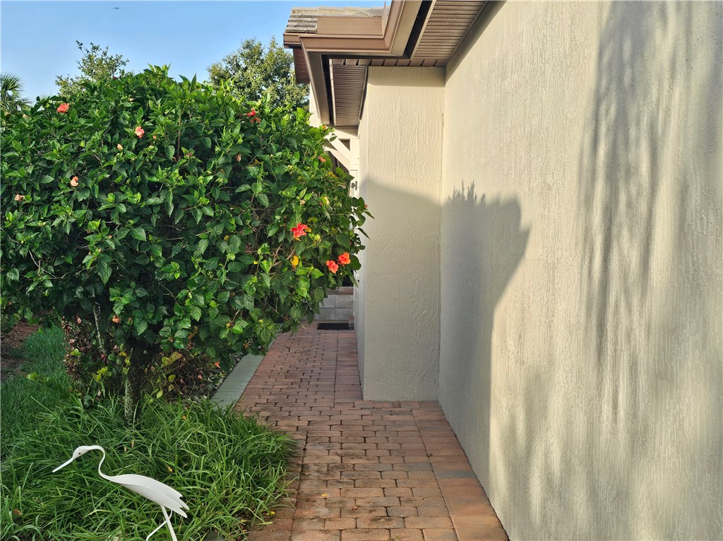 Paver walkway to side-entry door