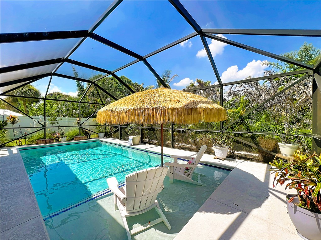 Private heated pool and screened in lanai.