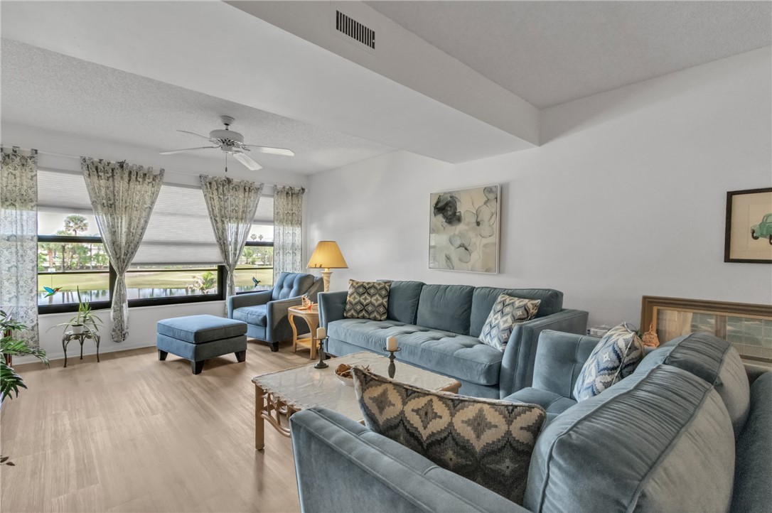 Enjoy stunning lake & golf course views from the living room & primary bedroom!