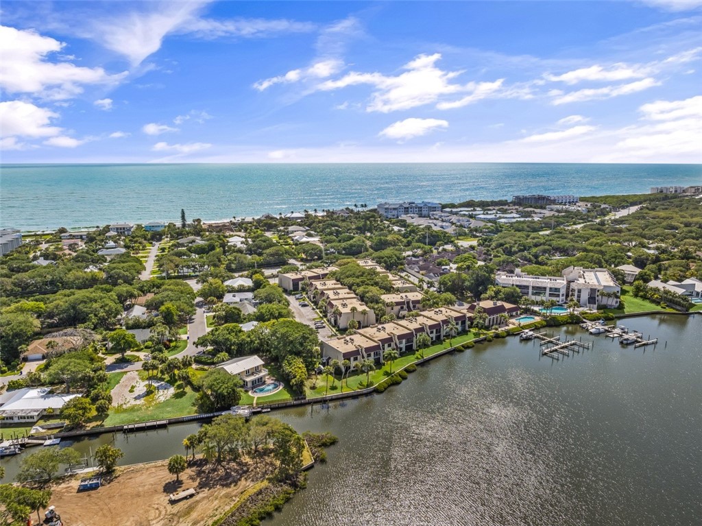 Coastal community with direct ocean access, waterfront properties, and established marine infrastructure