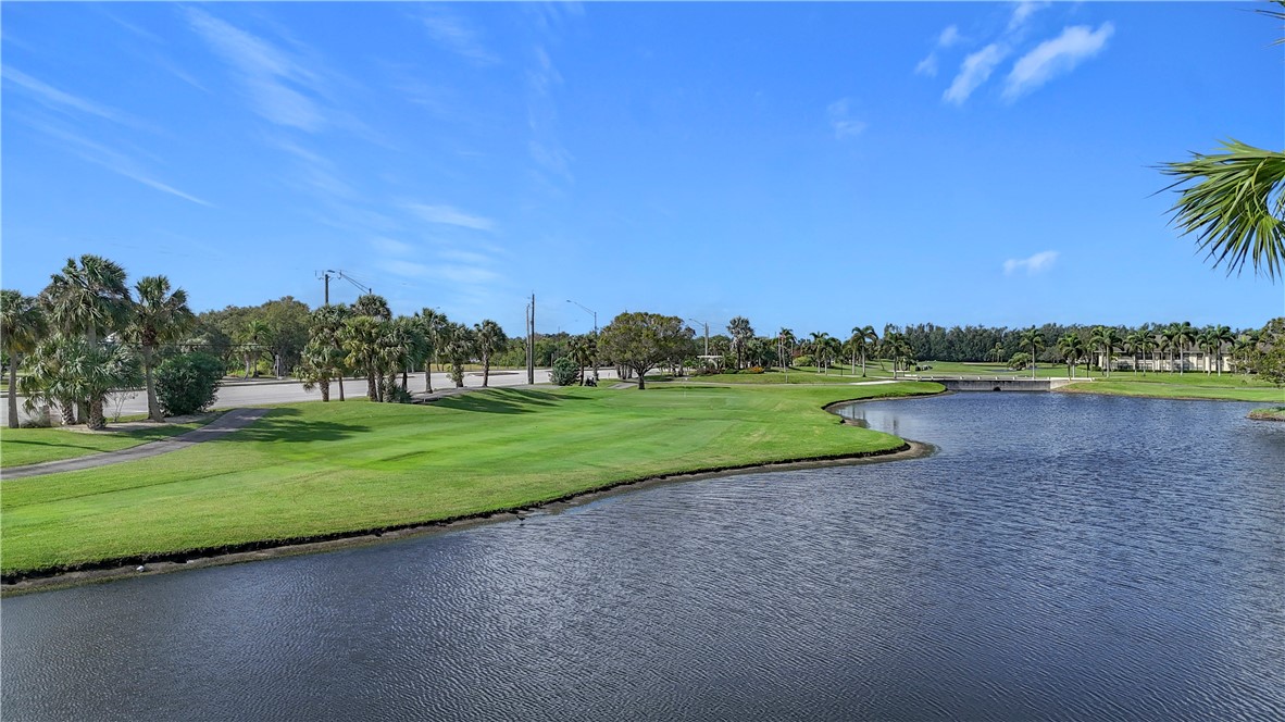 Enjoy stunning lake & golf course views from the living room & primary bedroom!