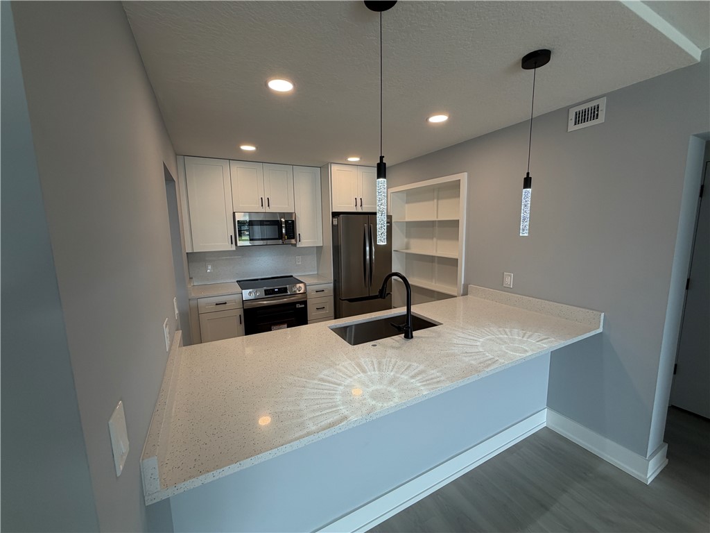Modern kitchen speckled white quartz countertop