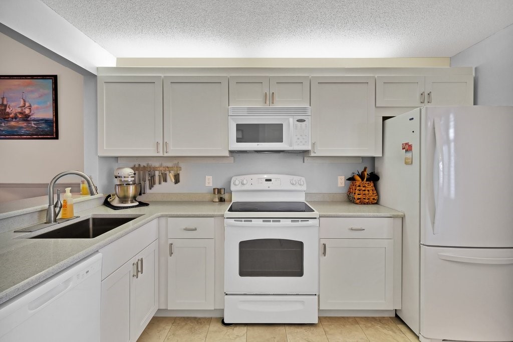 Kitchen cabinets & countertops were just completed in MARCH 2026. New Dishwasher too.