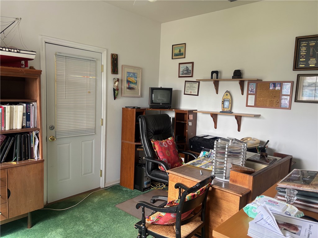 View of carpeted home office