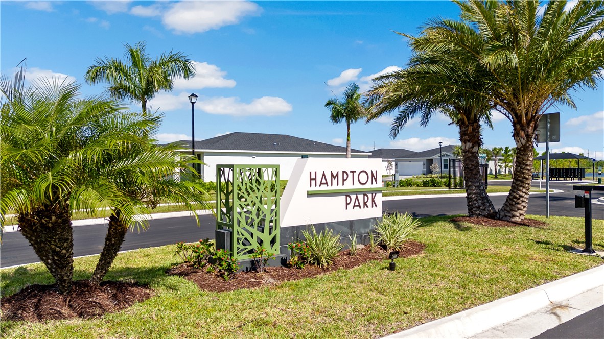 Community sign with a lawn