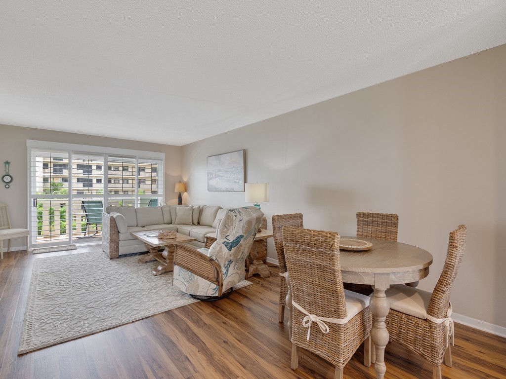 Living room with baseboards and wood finished floors