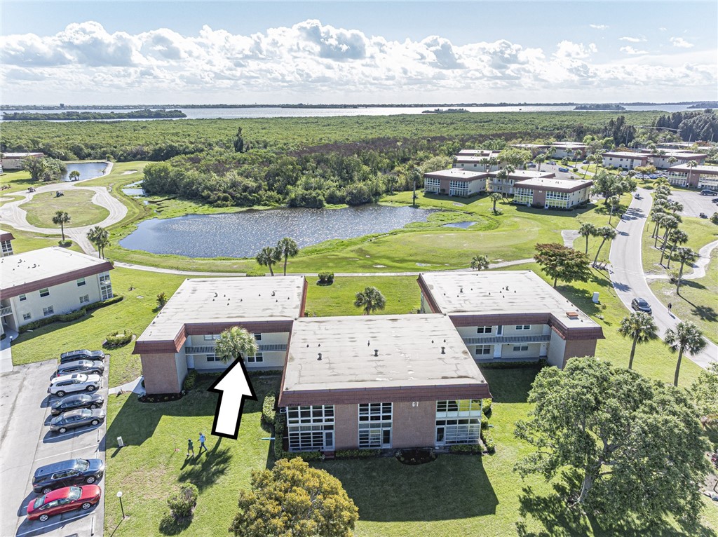 Drone / aerial view of a large body of water and a golf club