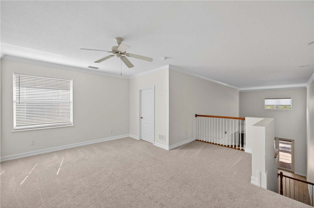 Upstairs loft overlooks living room.