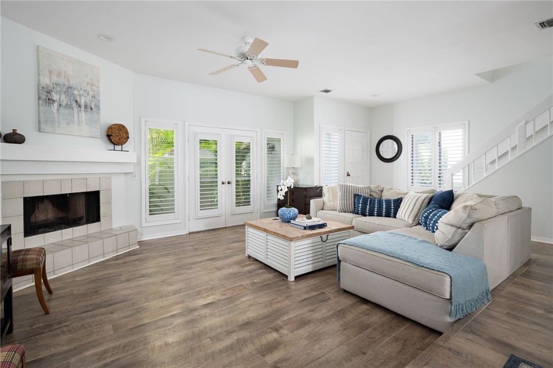 Living room with wood burning fireplace