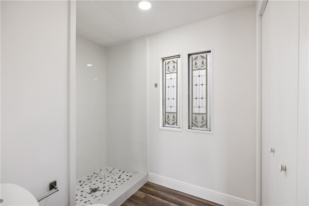 Full bath featuring recessed lighting and a walk in shower