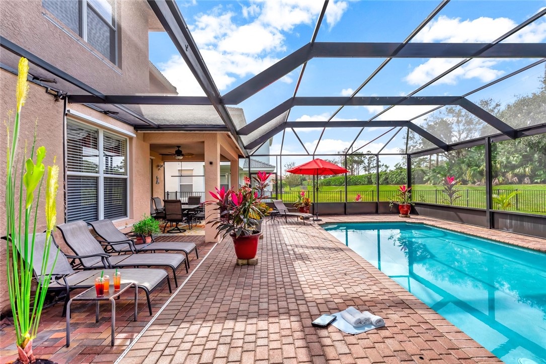 Private screened pool with extended pavered lanai