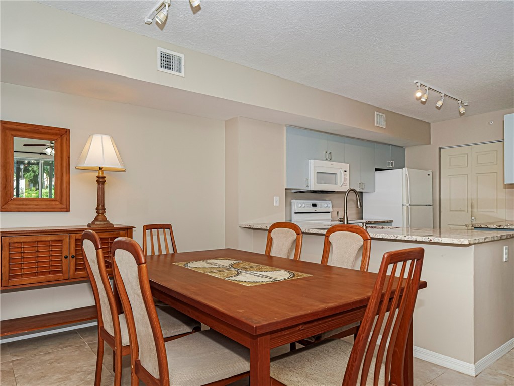 Lovely updated kitchen with newer appliances, pull out shelves and newer washer and dryer. Wood table for six, you are all ready for entertaining.