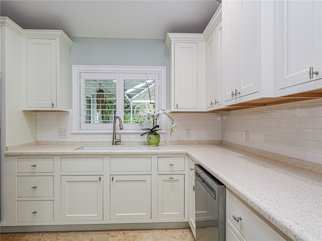 Custom kitchen soft-close cabinetry, granite countertops.