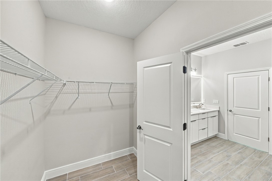 Walk-in closet with wire shelving