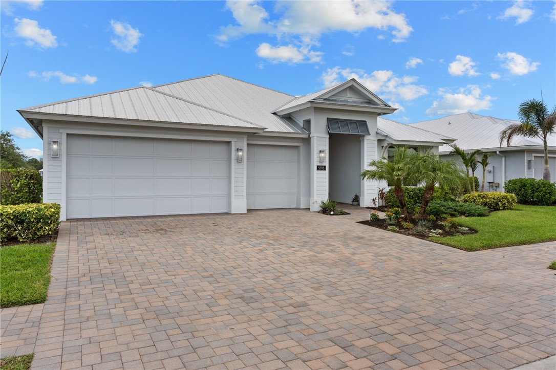 3-car Garage, paver drive & sidewalks