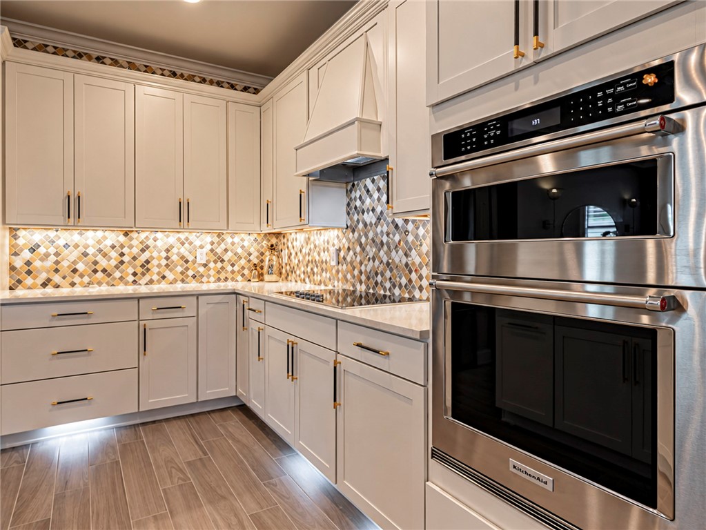 Designer Cabinet Hardware, undercabinet floor lighting.