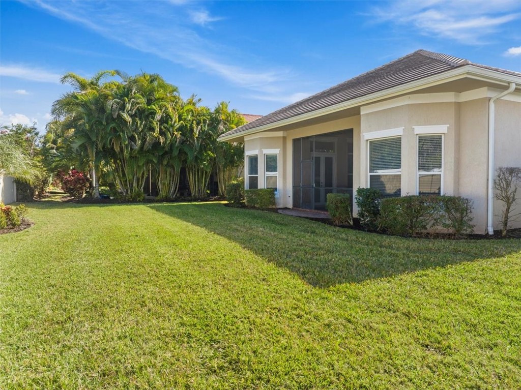 Rear view to private backyard