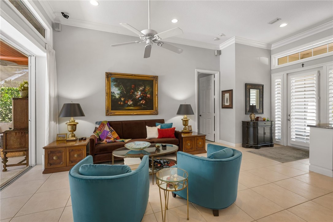 Living room with view of entry way and lanai