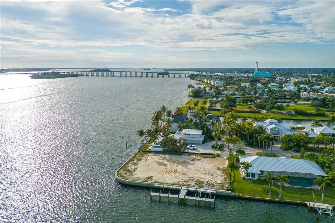 Bird's eye view of a large body of water and a notable bridge