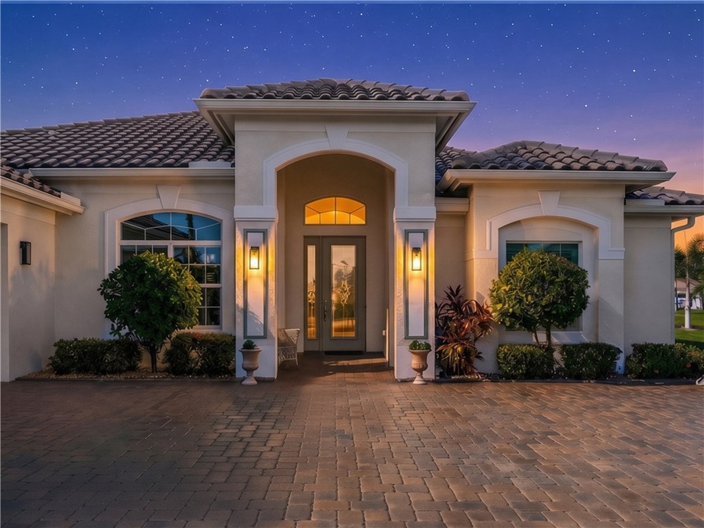 Front of home, digitally generated twilight.