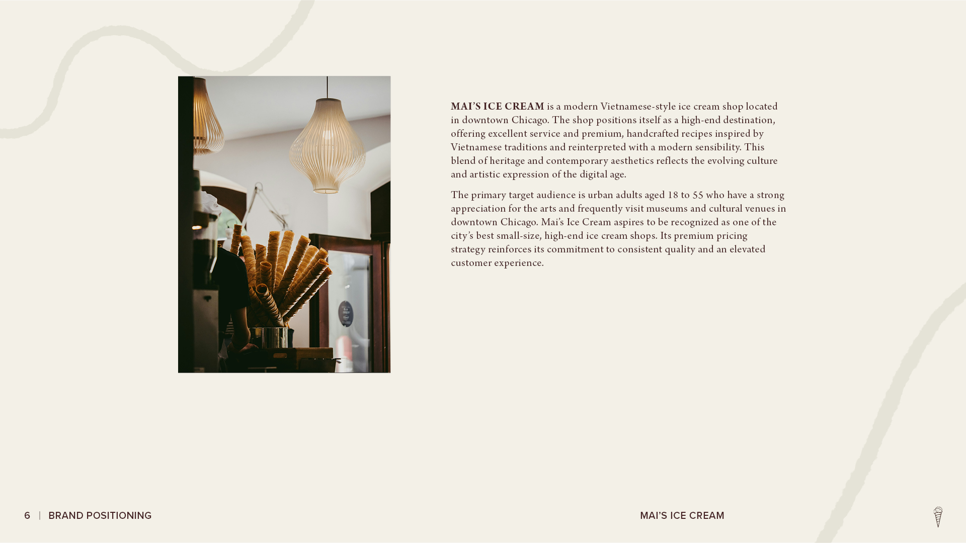 Mai’s Ice Cream brand positioning page featuring a shop interior photo with stacked waffle cones and text describing the brand’s market position, target audience, and premium customer experience.