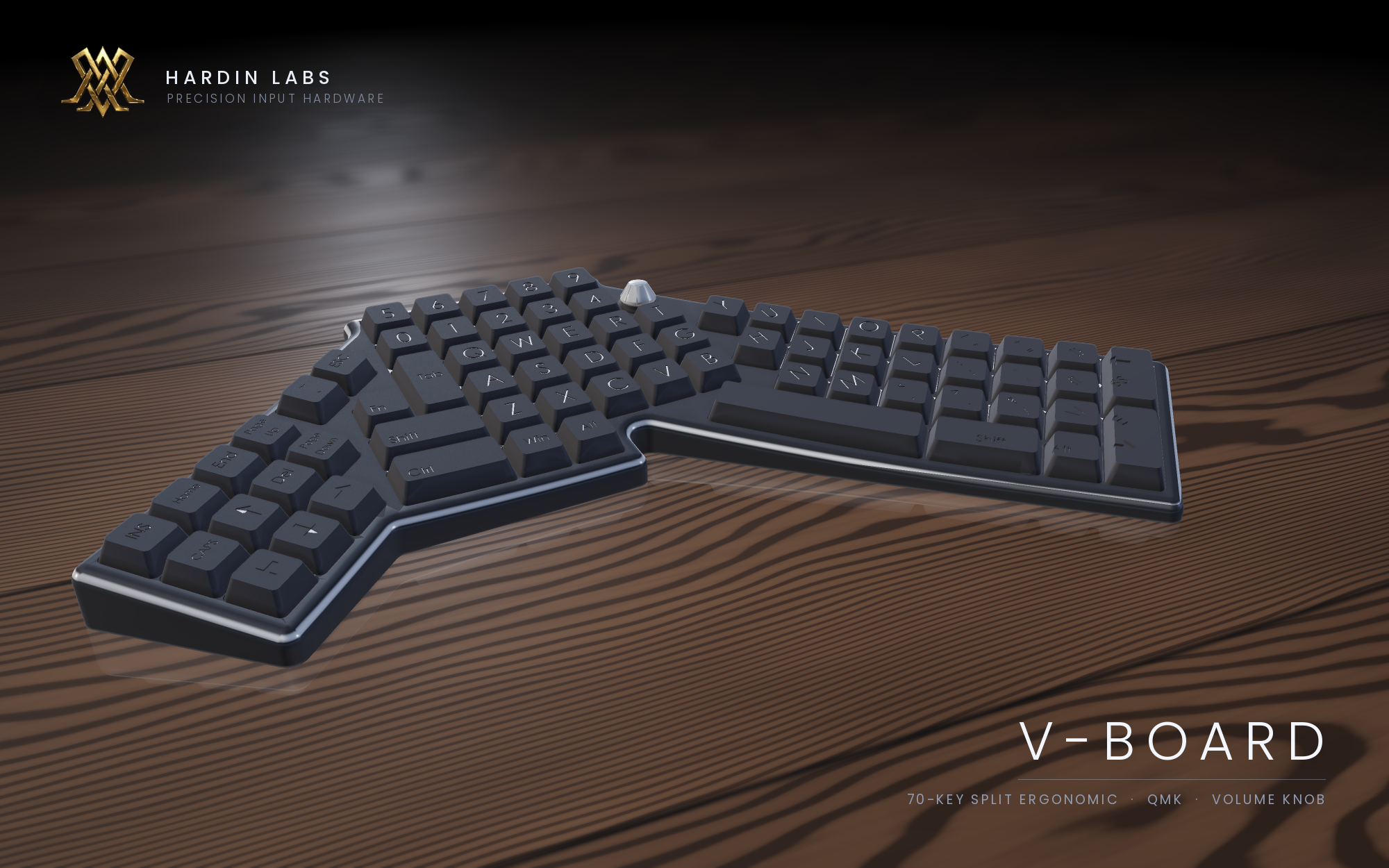The Hardin V-Board: a 70-key keyboard with its two halves angled outward from a flat central block, with a volume knob beside the number row