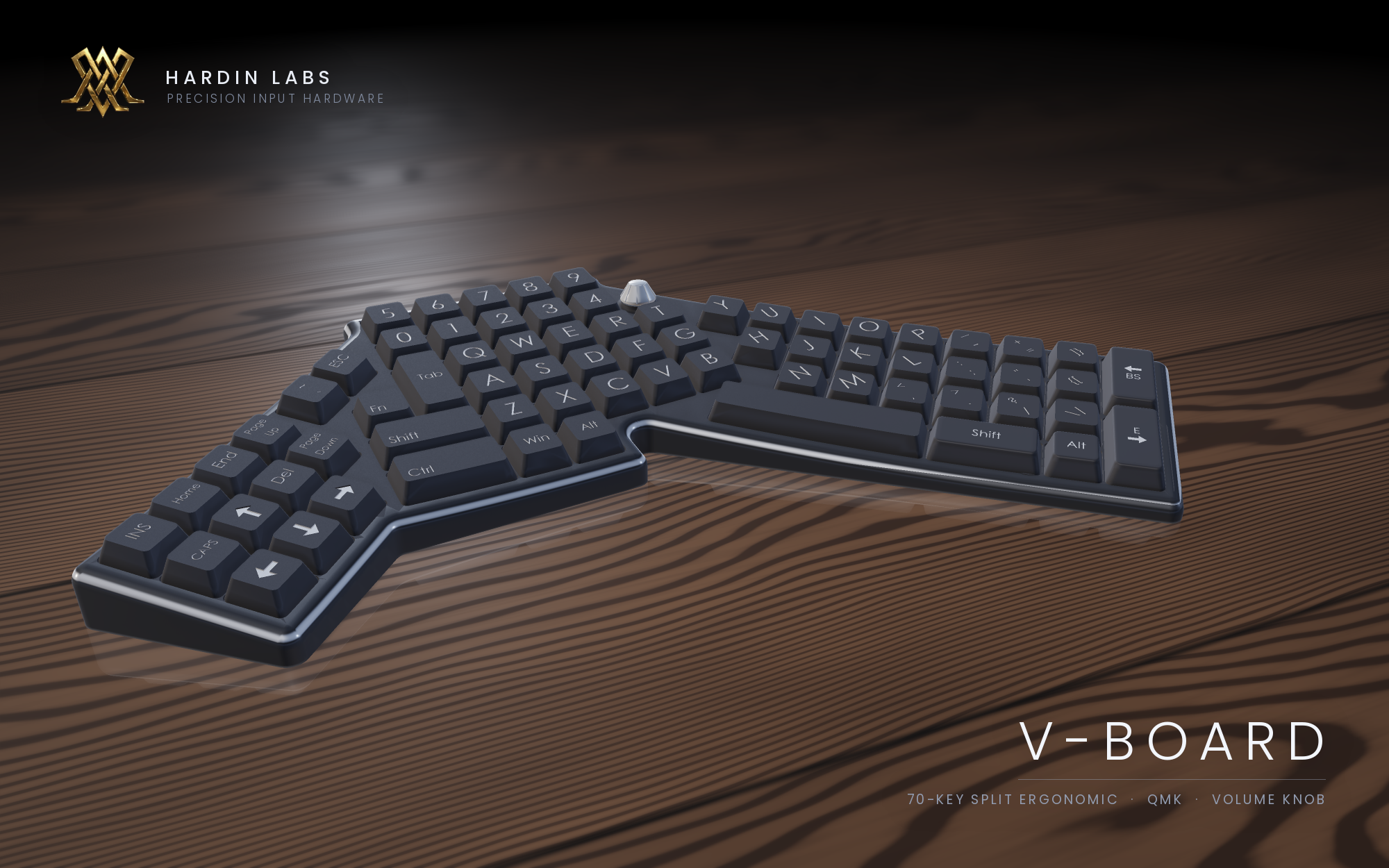 The Hardin V-Board: a 70-key keyboard with its two halves angled outward from a flat central block, with a volume knob beside the number row