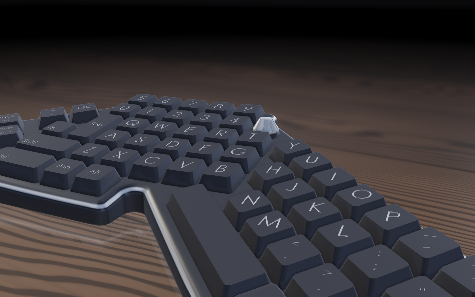 Close view of the volume knob standing proud of the keycaps at the end of the number row