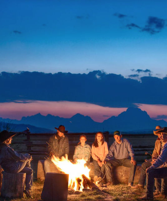 Campfire gathering at dusk