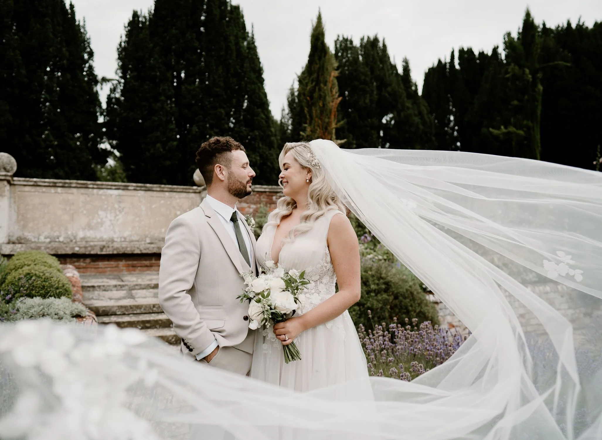 A bride's veil in the lavender at Lanwades Hall