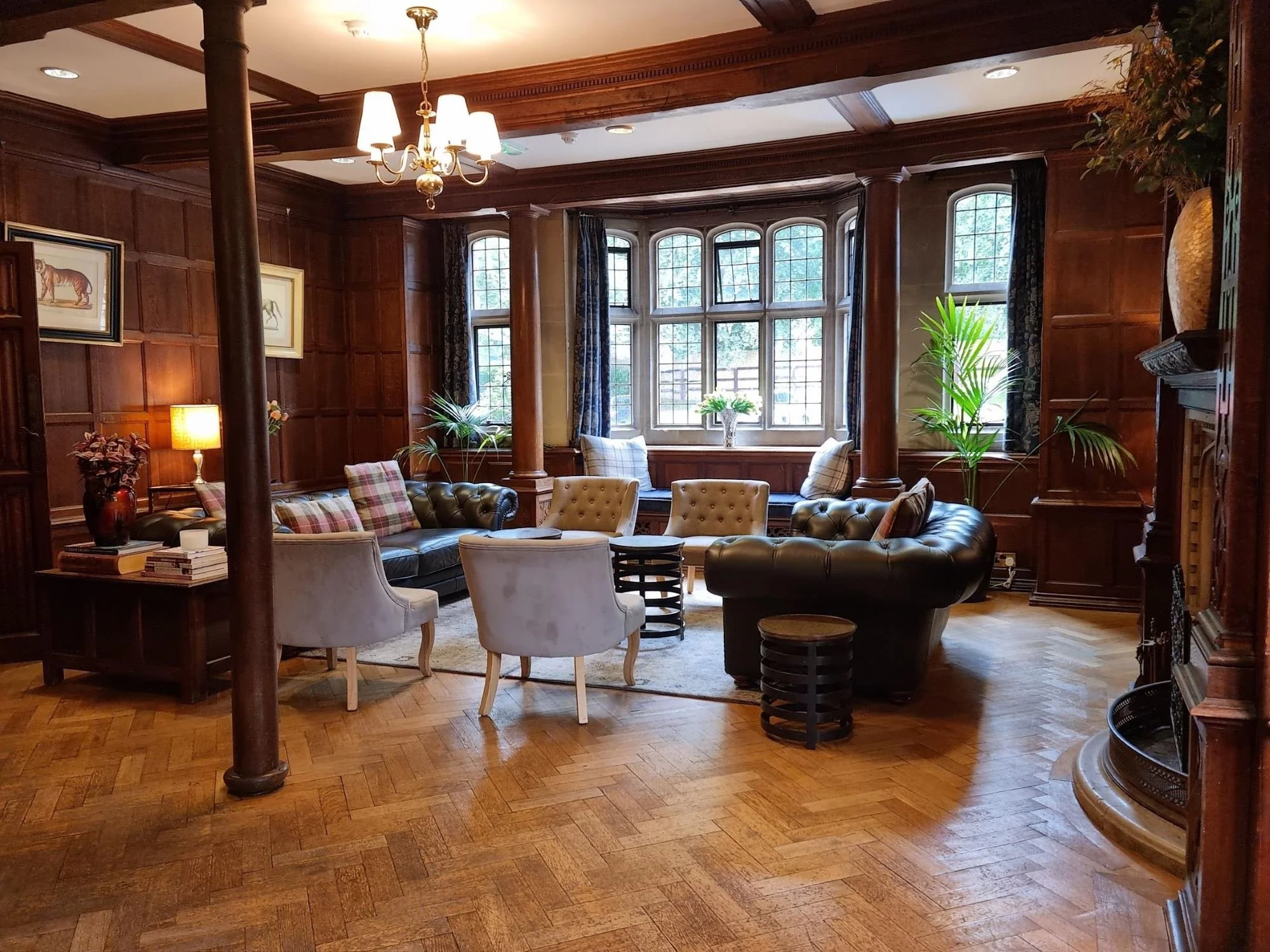 Comfortable leather sofas in the Drawing Room at Lanwades Hall