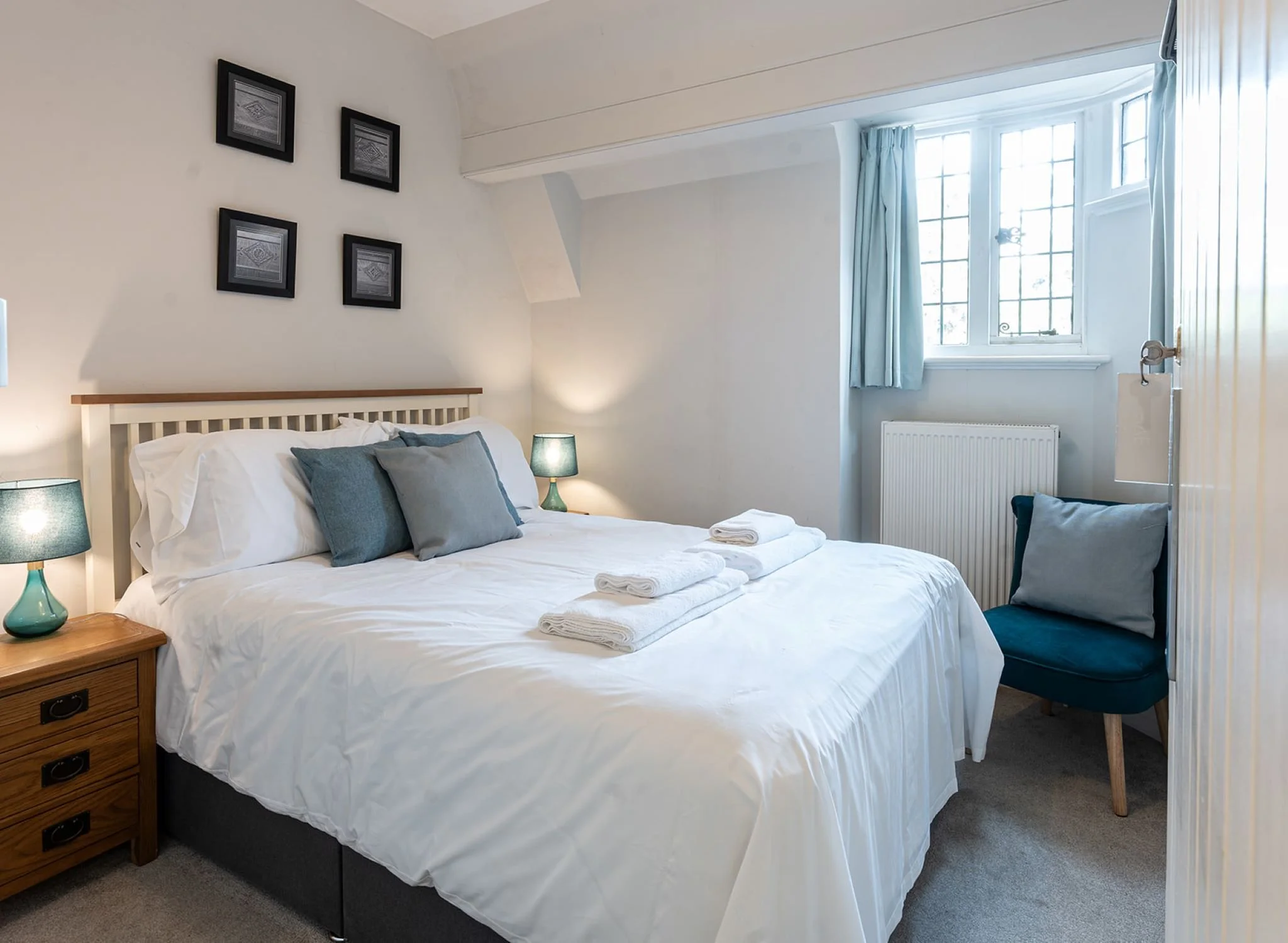 A bedroom in the Attic Apartment at Lanwades Hall