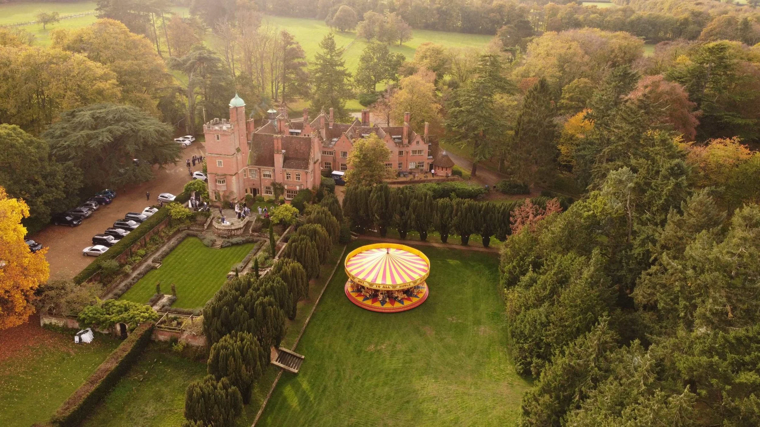 A summer party in the grounds at Lanwades Hall, from above