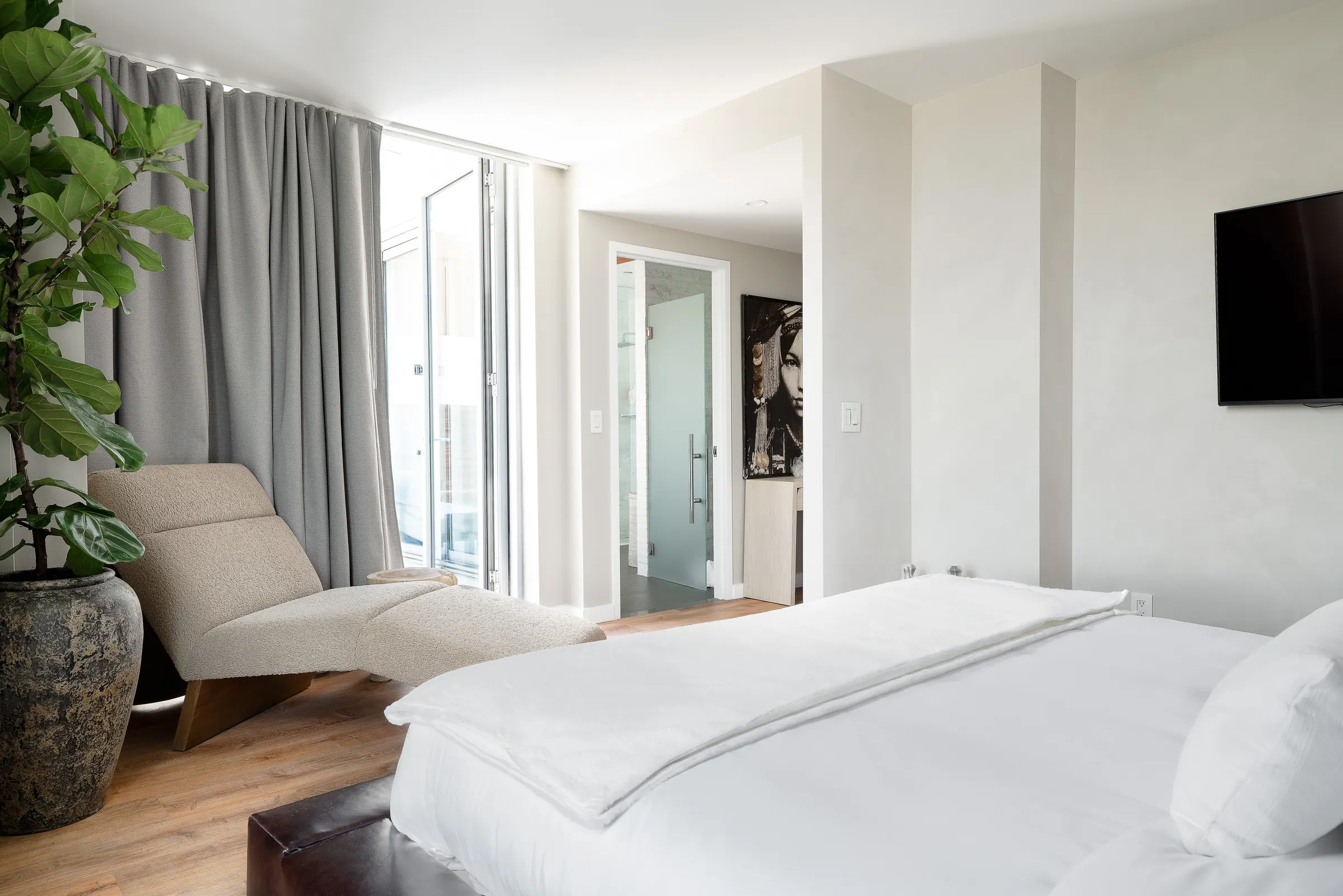 The bedroom looking toward the terrace doors