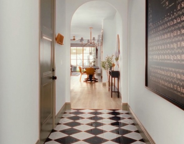 Black and white tiled hallway by Todd Pro Service