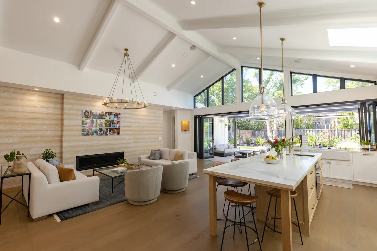 Goldenway construction project featuring a bright, open-concept living and kitchen area with a large island and modern design.