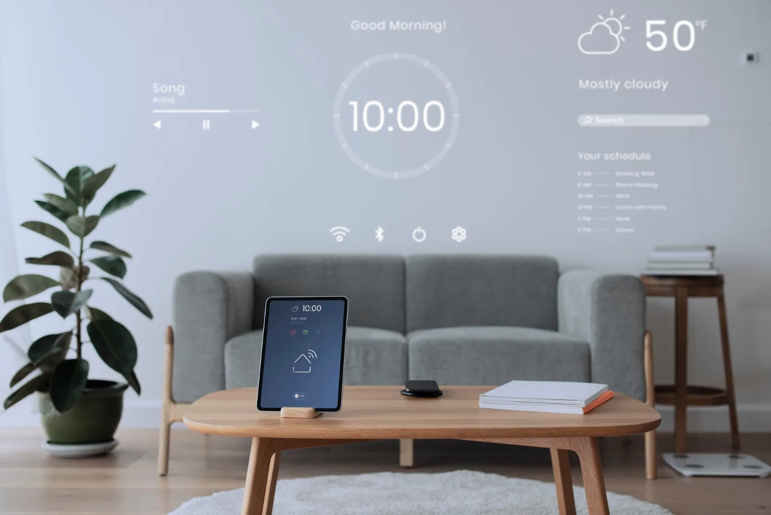 Smart home automation and AI technology integration in a modern living room featuring a control tablet and projected digital interface.