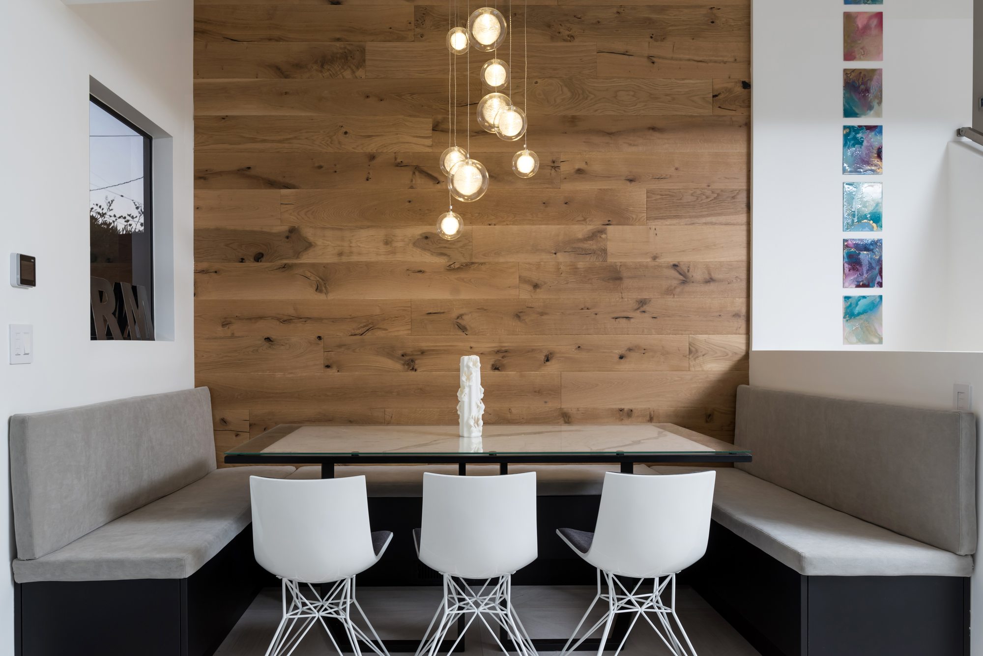 Thurm Avenue, a remodel in Belmont by Greenberg, the dining banquette and slat wall