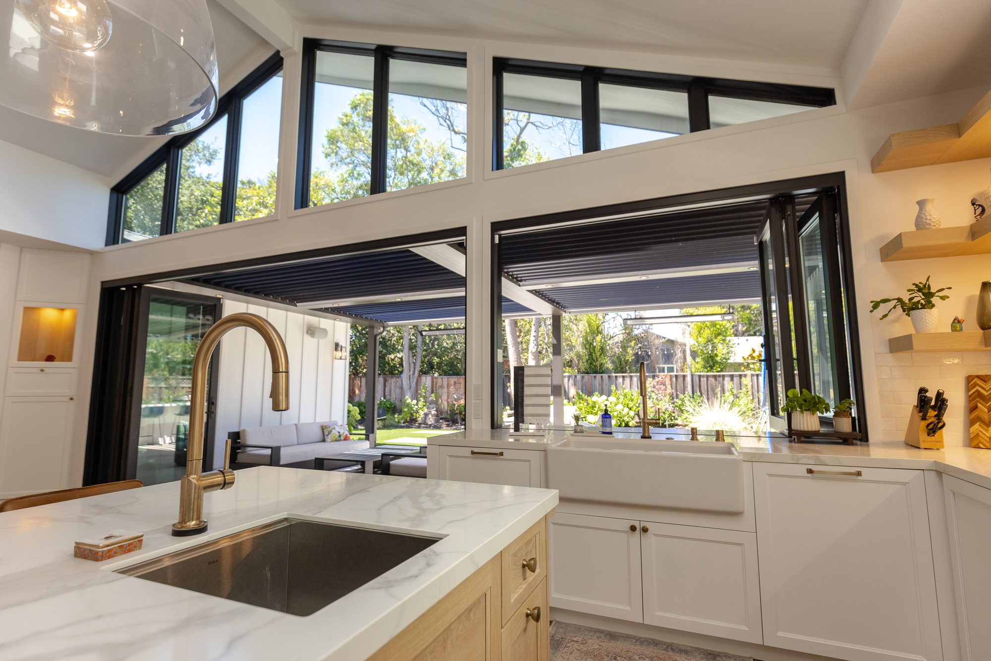 Golden Way, a new build in Los Altos by Greenberg, the kitchen window and brass tap