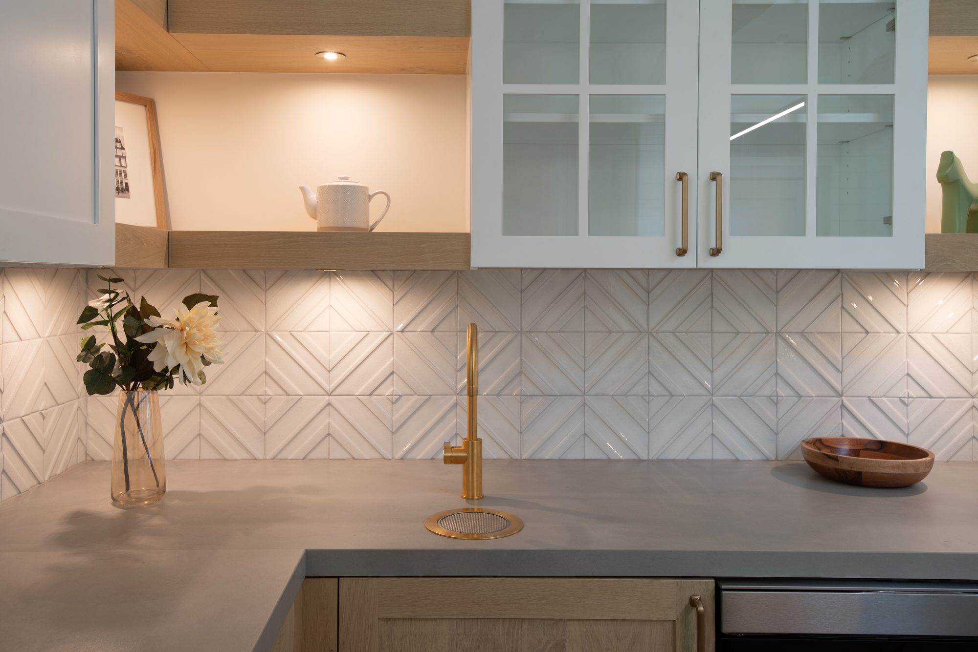 Springer, a remodel in Los Altos by Greenberg, the backsplash and brass tap