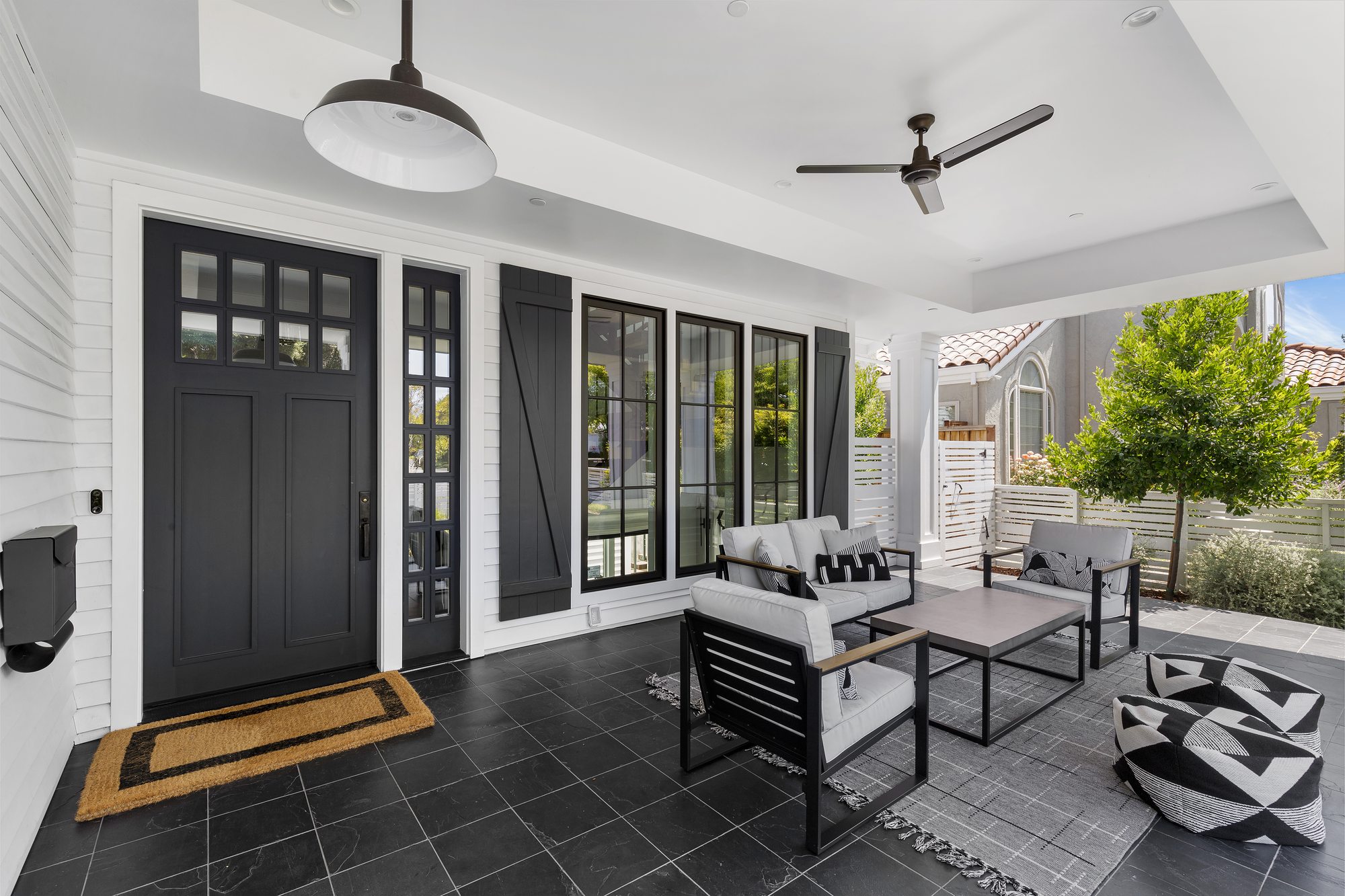 Amaranta Ave, a new build in Palo Alto by Greenberg, the front porch sitting area