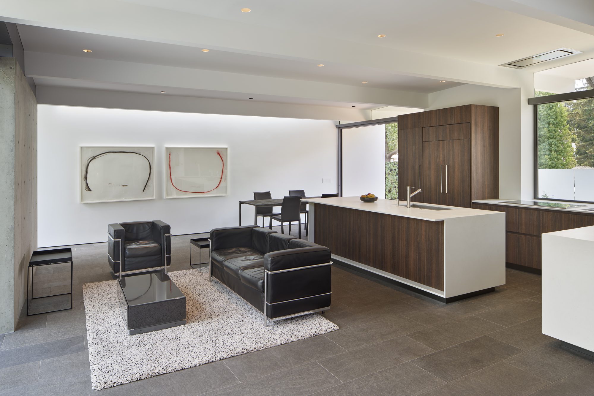 Edgewood Drive, a new build in Palo Alto by Greenberg, the living room and walnut kitchen