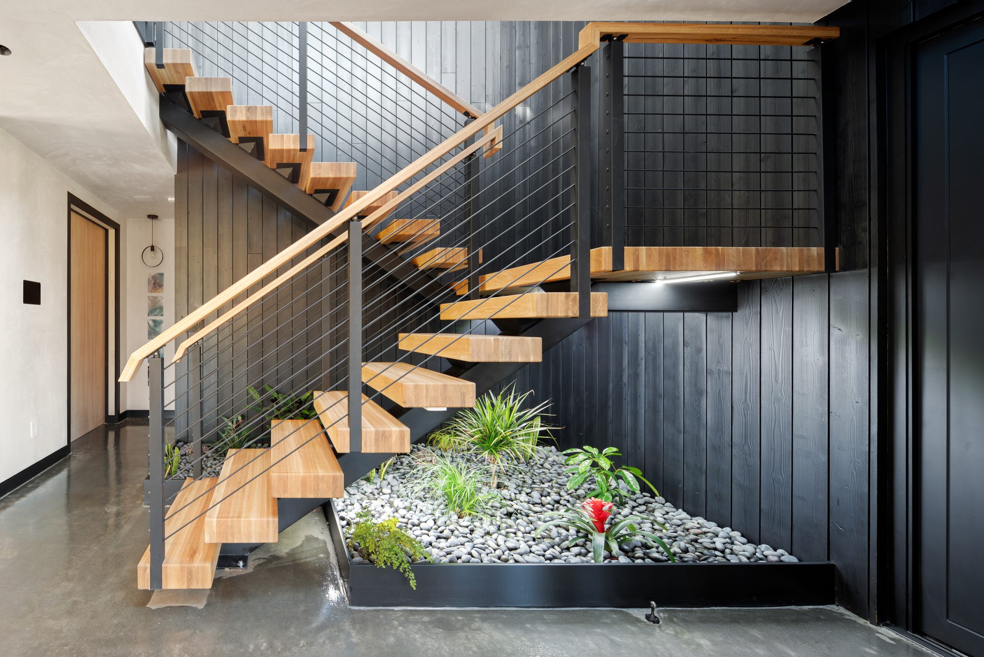 Colorado Ave, a new build in Palo Alto by Greenberg, the floating stair and planted bed