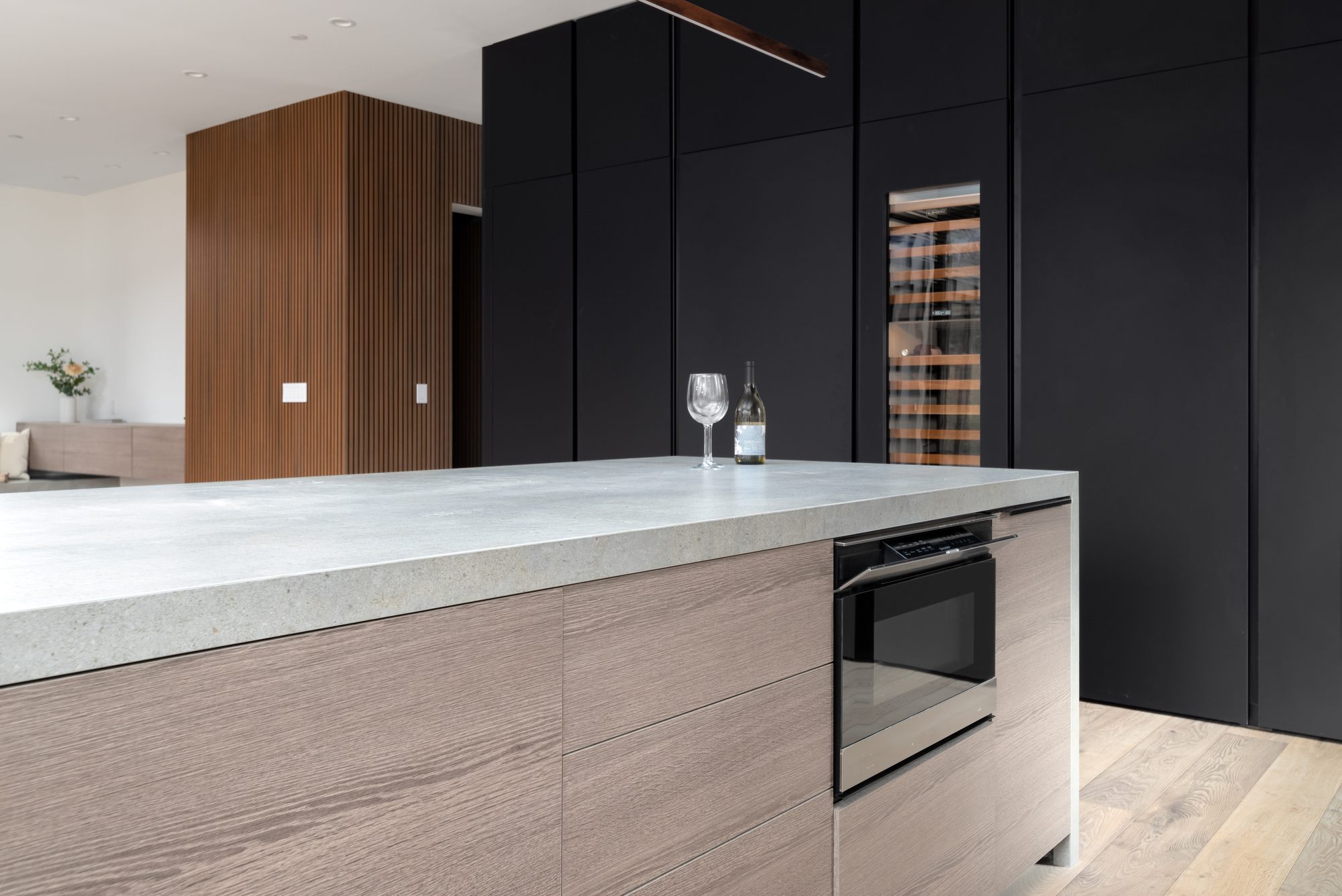 Stockbridge, a new build in Redwood City by Greenberg, the kitchen island and black cabinetry