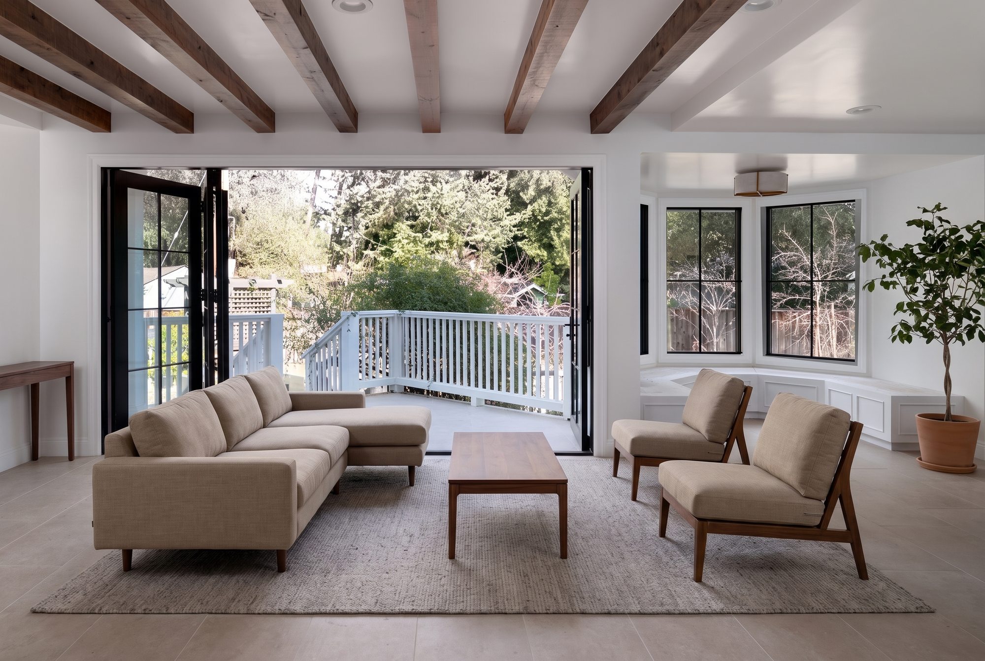 Pierce Rd, a new build in Saratoga by Greenberg, the great room with the doors folded open