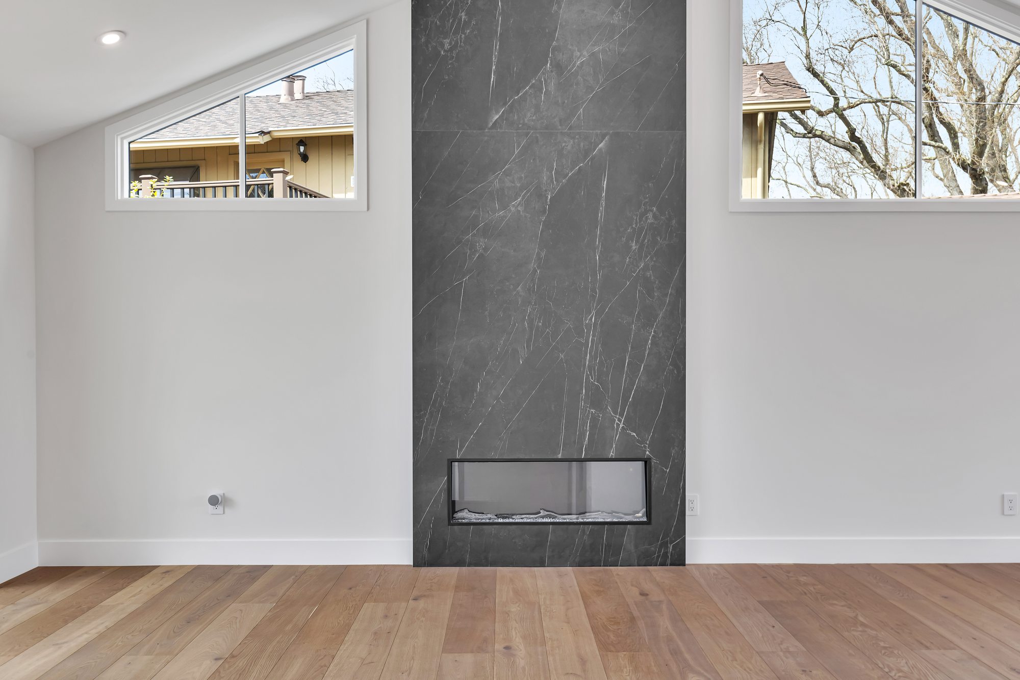Westwood St, a remodel in Redwood City by Greenberg, the stone fireplace wall