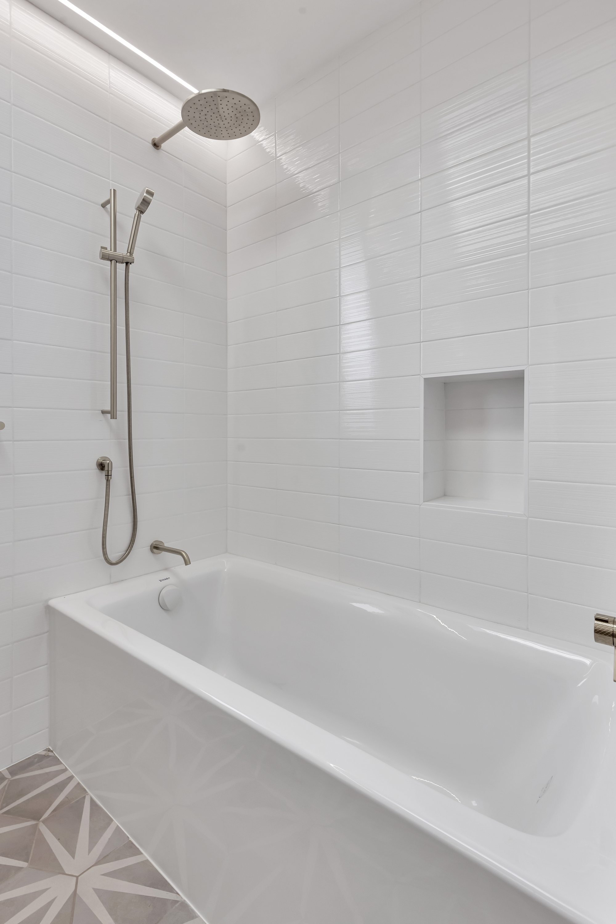 Westwood St, a remodel in Redwood City by Greenberg, the tub