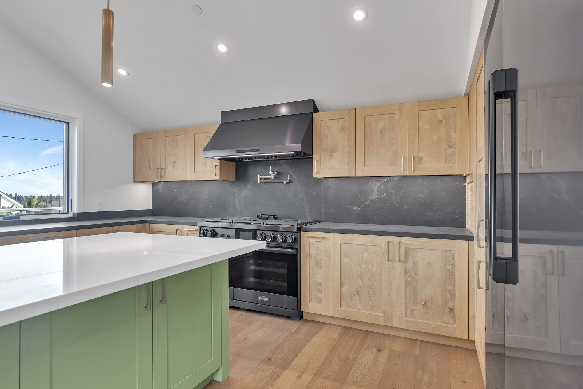 Westwood St, a remodel in Redwood City by Greenberg, the kitchen, oak against black